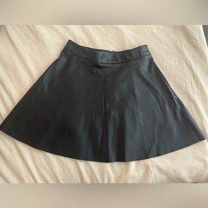 Leather-styled black mini skirt